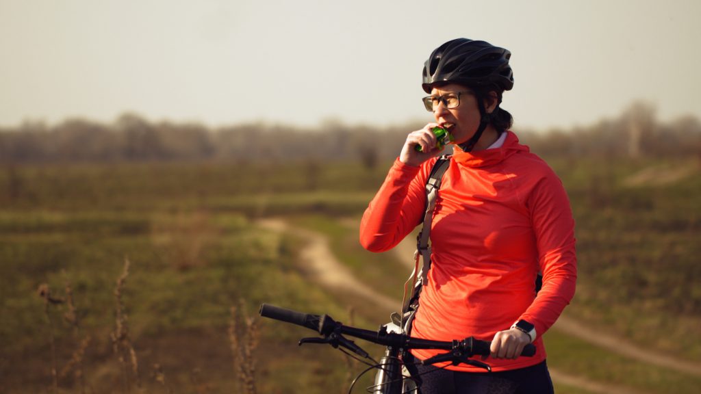 Cyclist eating food