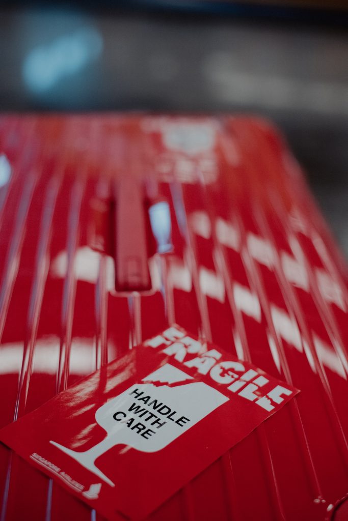 mark luggage as fragile so monitor is handled with care